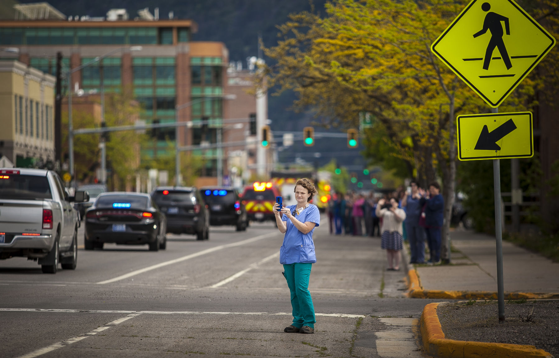 Marjorie Sonneborn films the motorcade
